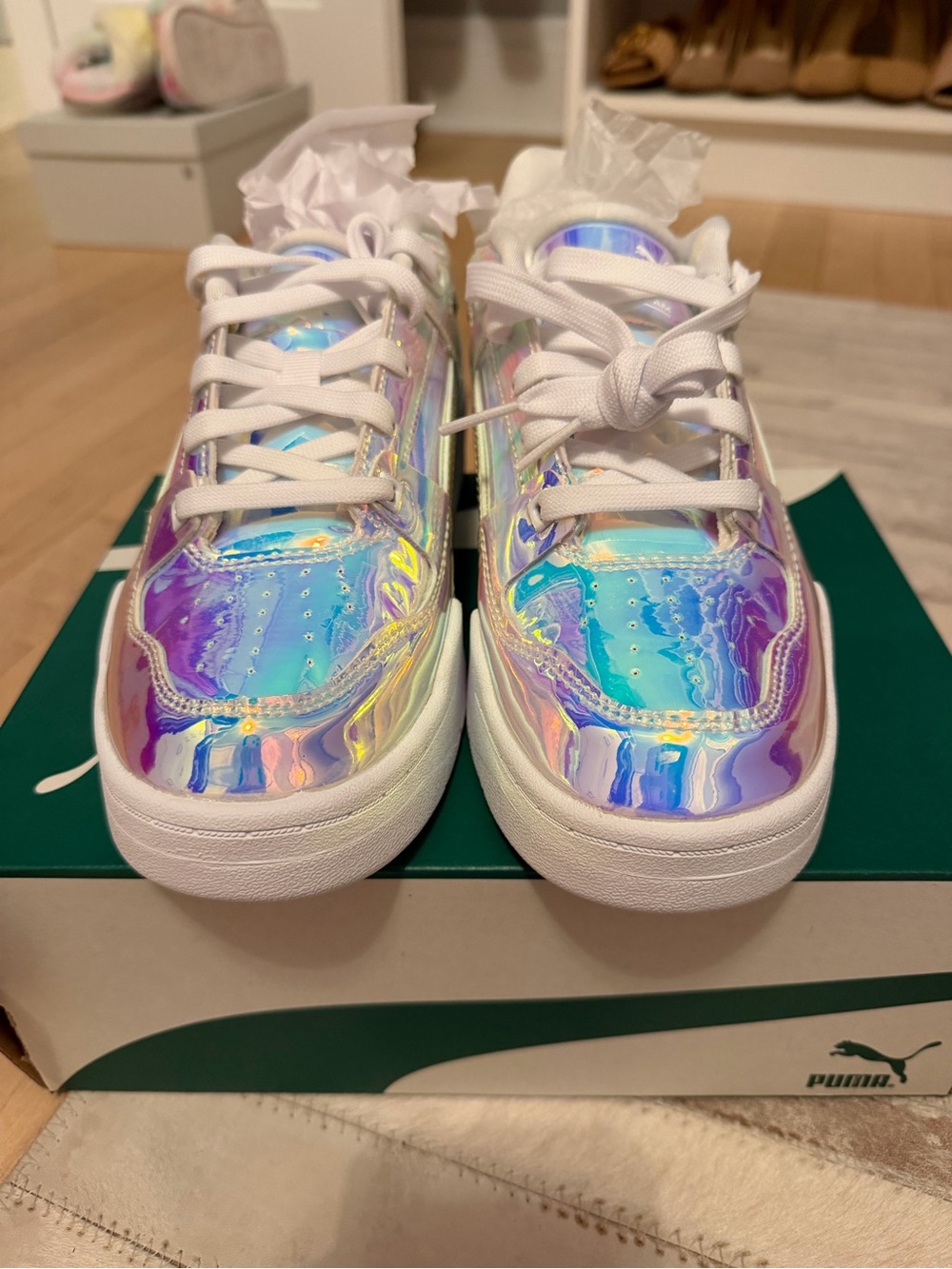 Puma women’s Iridescent Holographic Lace-Up Sneakers in White